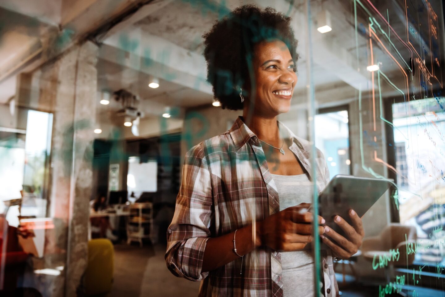 Software, coding and business woman on tablet thinking of data analytics, digital technology.