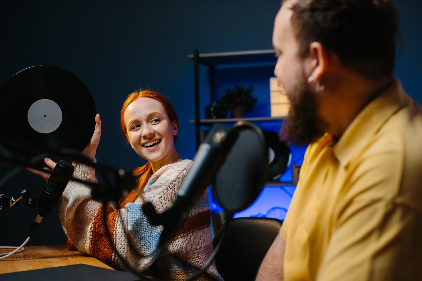 people podcasting and reading ads