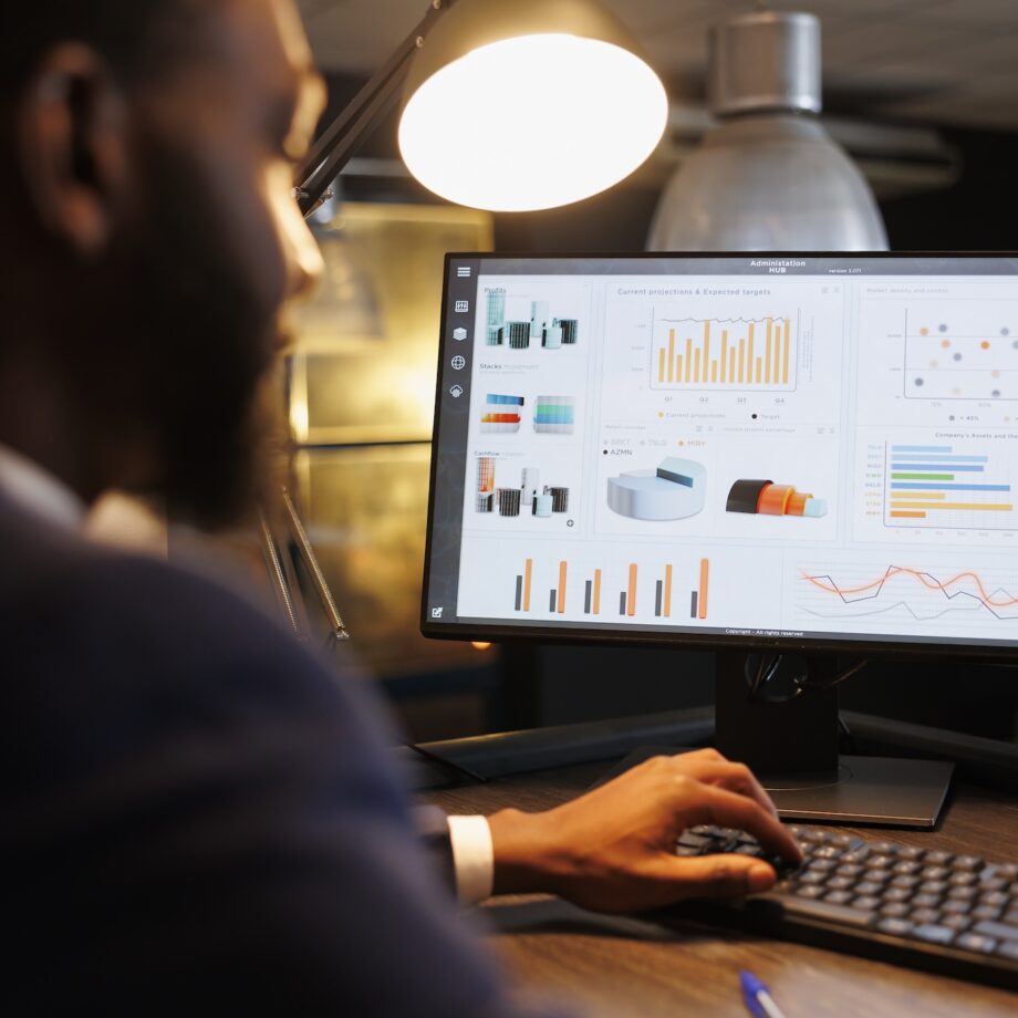 careful businessman looking at marketing graphs 2025 02 17 09 07 37 utc