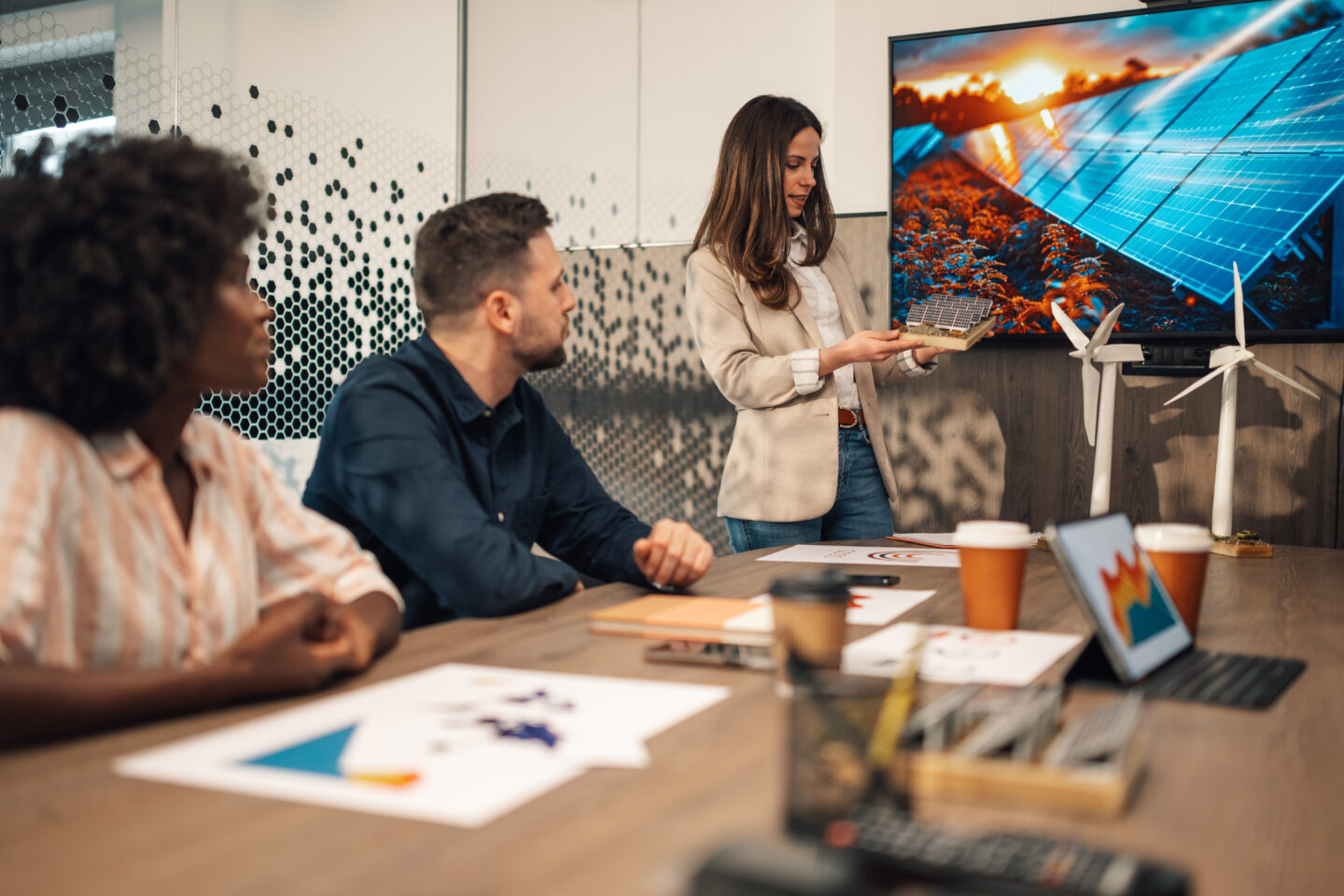 businesswoman with solar panels model having prese 2025 04 03 21 00 56 utc
